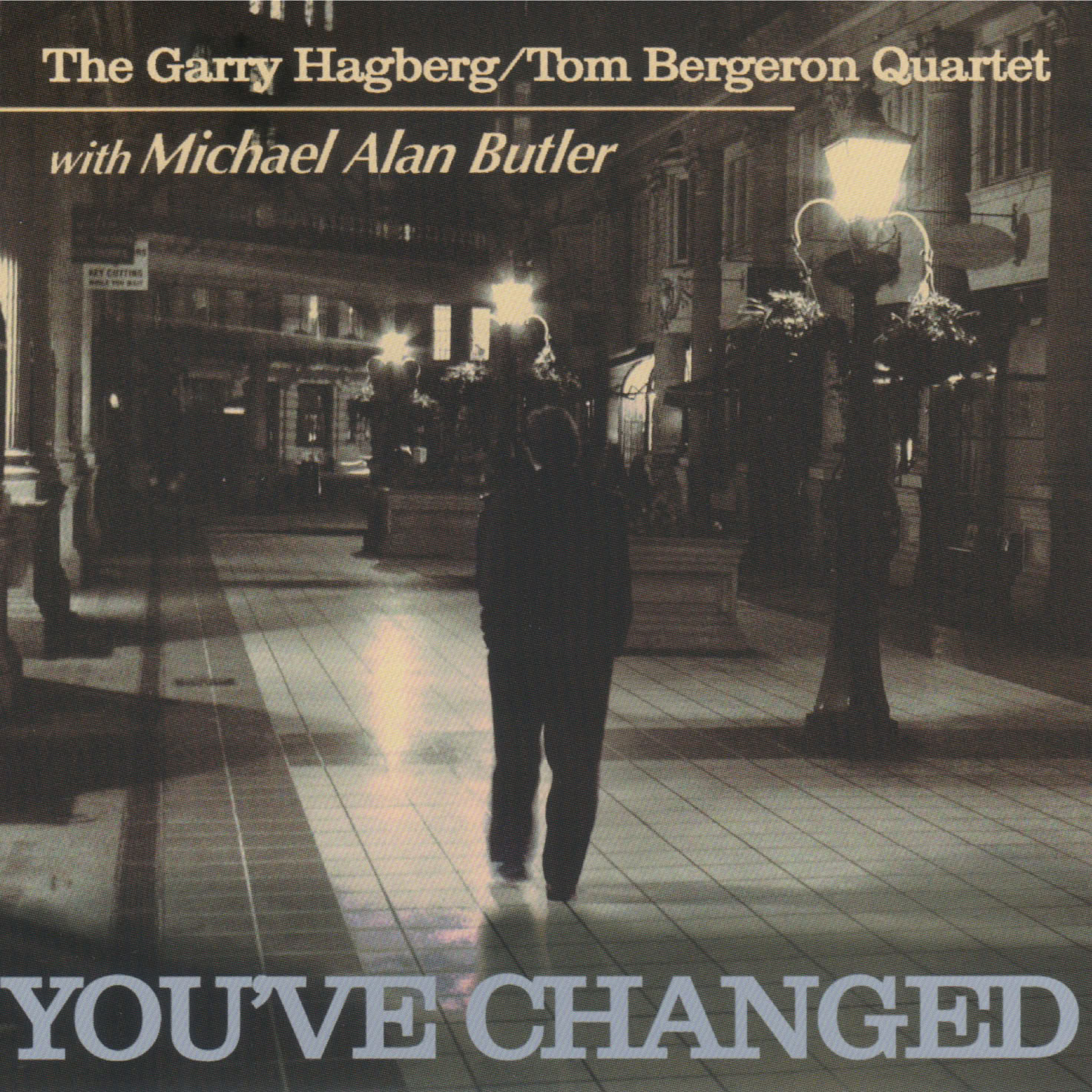 A detailed view of a saxophone resting on sheet music, highlighting its brass finish.